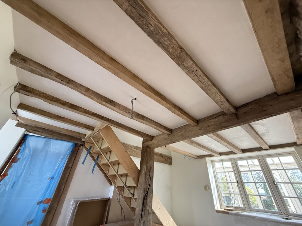 lime plastering ceilings and walls in traditional lime plaster in a cottage in much wenlock shropshire