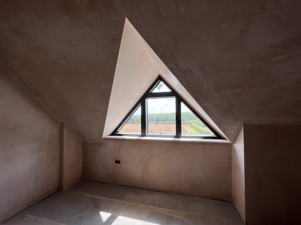 Smooth freshly plastered interior wall in a Shropshire home, showing clean finish and professional workmanship